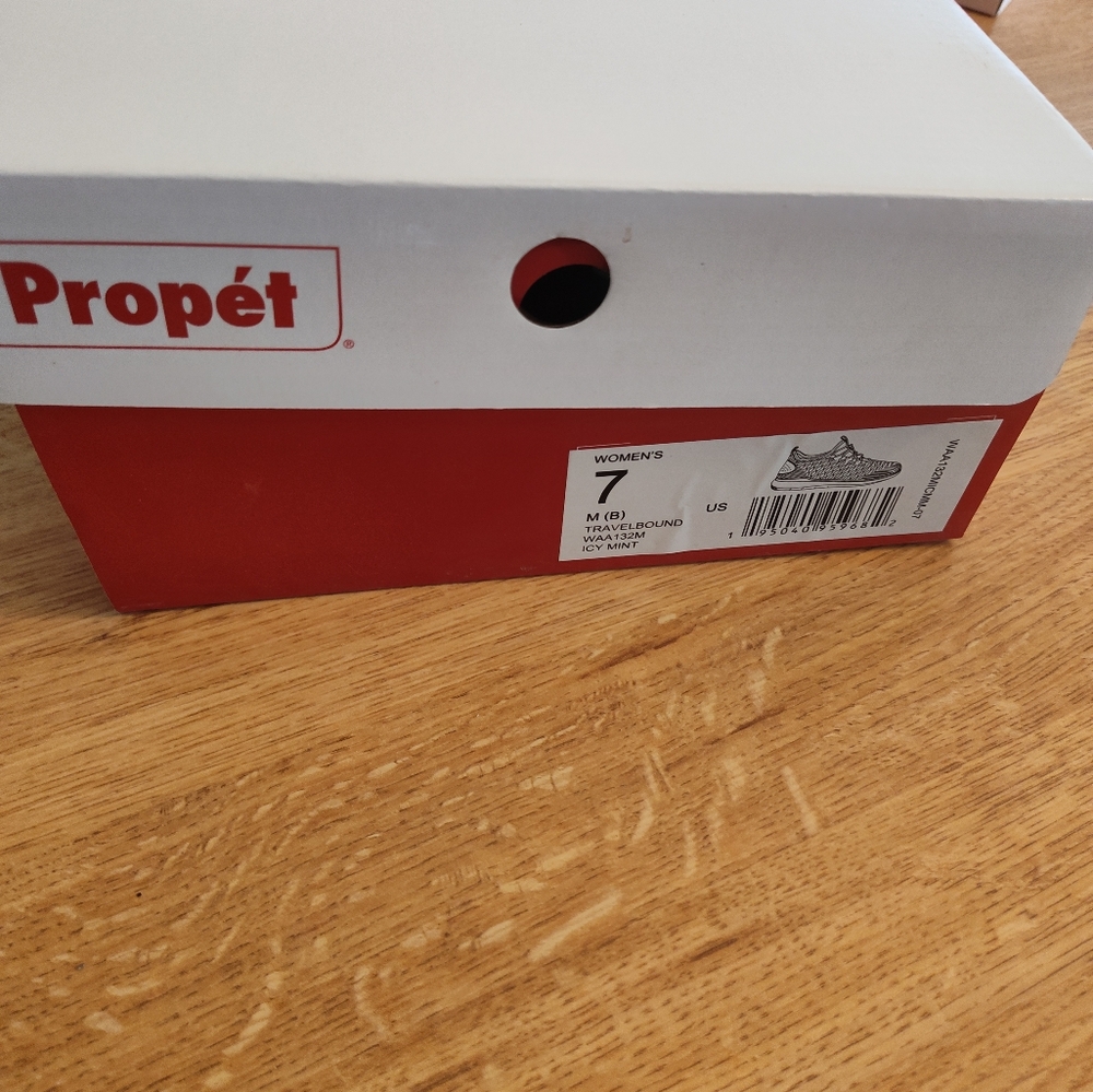 Size 7 mint green Propet Travel bound sneakers
